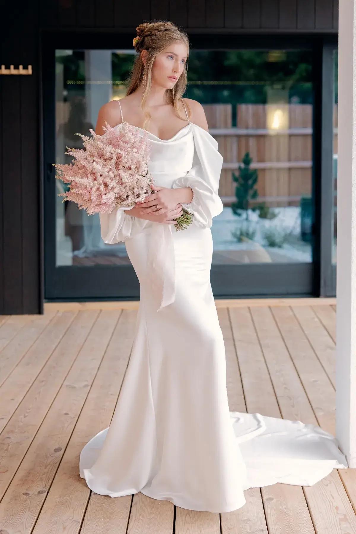 Model wearing Willowby wedding dress